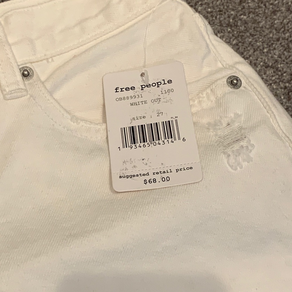 Free people distressed white jean shorts